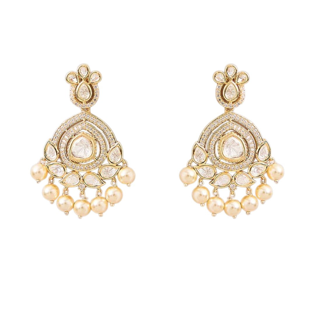 White Kundan necklace set with gold-tone detailing pearl drops and matching earrings
