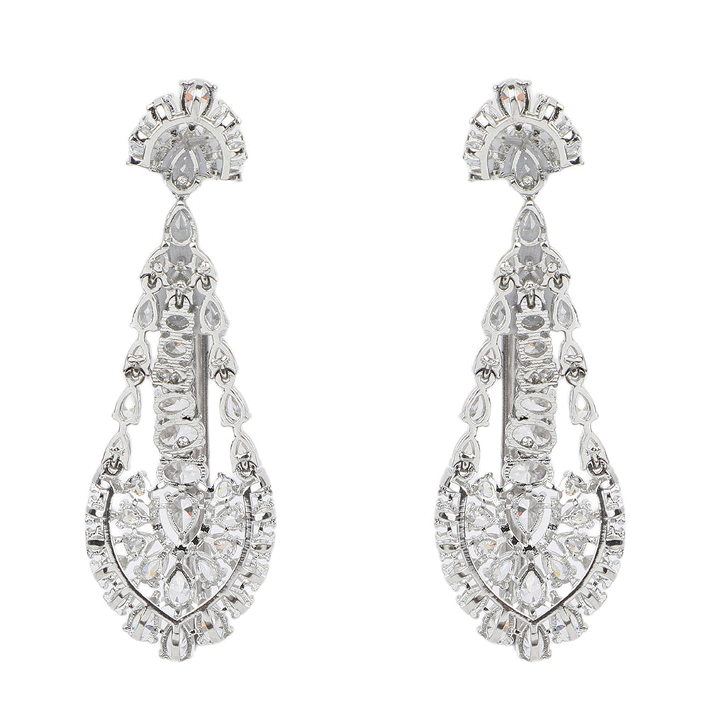 Silver American diamond necklace set with heart-shaped drop design and matching long earrings on white background