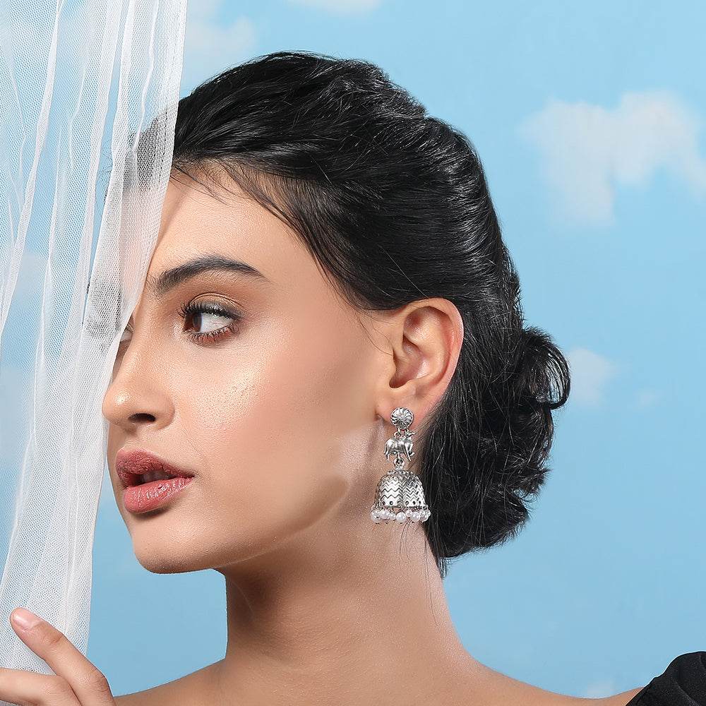 Aviana Oxidized Silver Cow Motif Jhumka Earrings with Pearl Beads - Auraa Trends