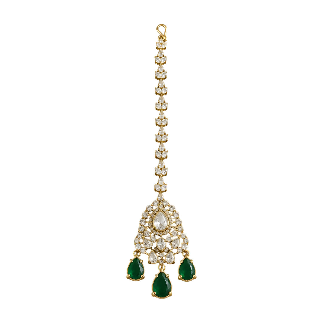 Gold triangle maang tikka with clear kundan stones and emerald green teardrop drops, Indian bridal hair jewelry on white background