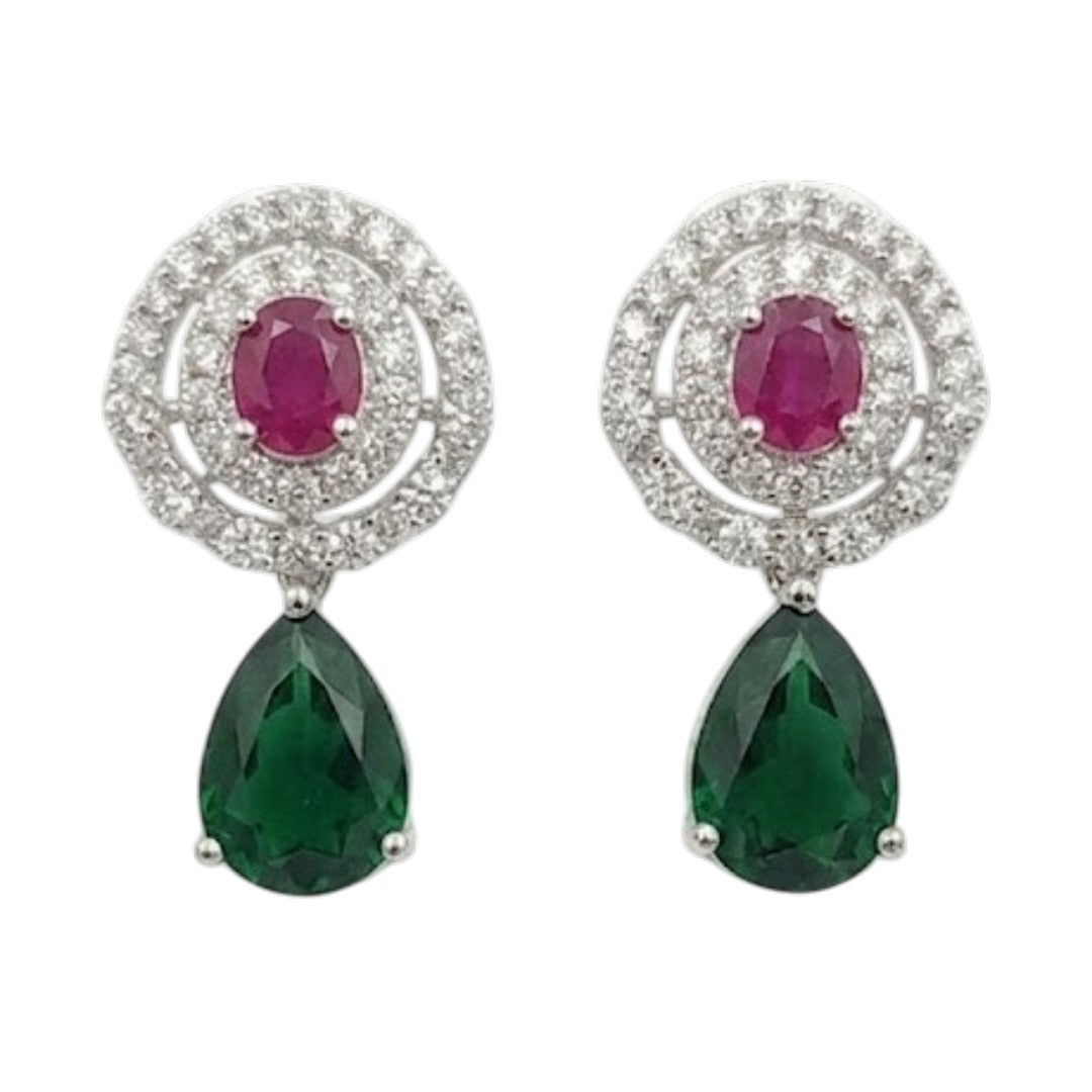 Luxury emerald green and ruby stone diamond-finish necklace set with matching earrings on white background.