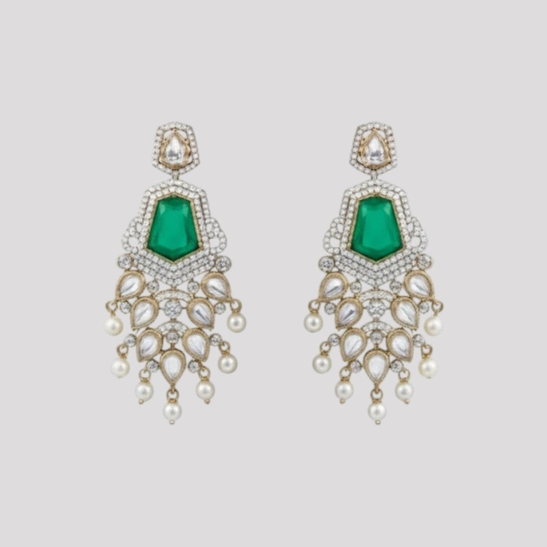 "Long gold-finish necklace set with emerald green stones, white American Diamond detailing, cascading pearl-style drops and matching long earrings displayed on a light background."