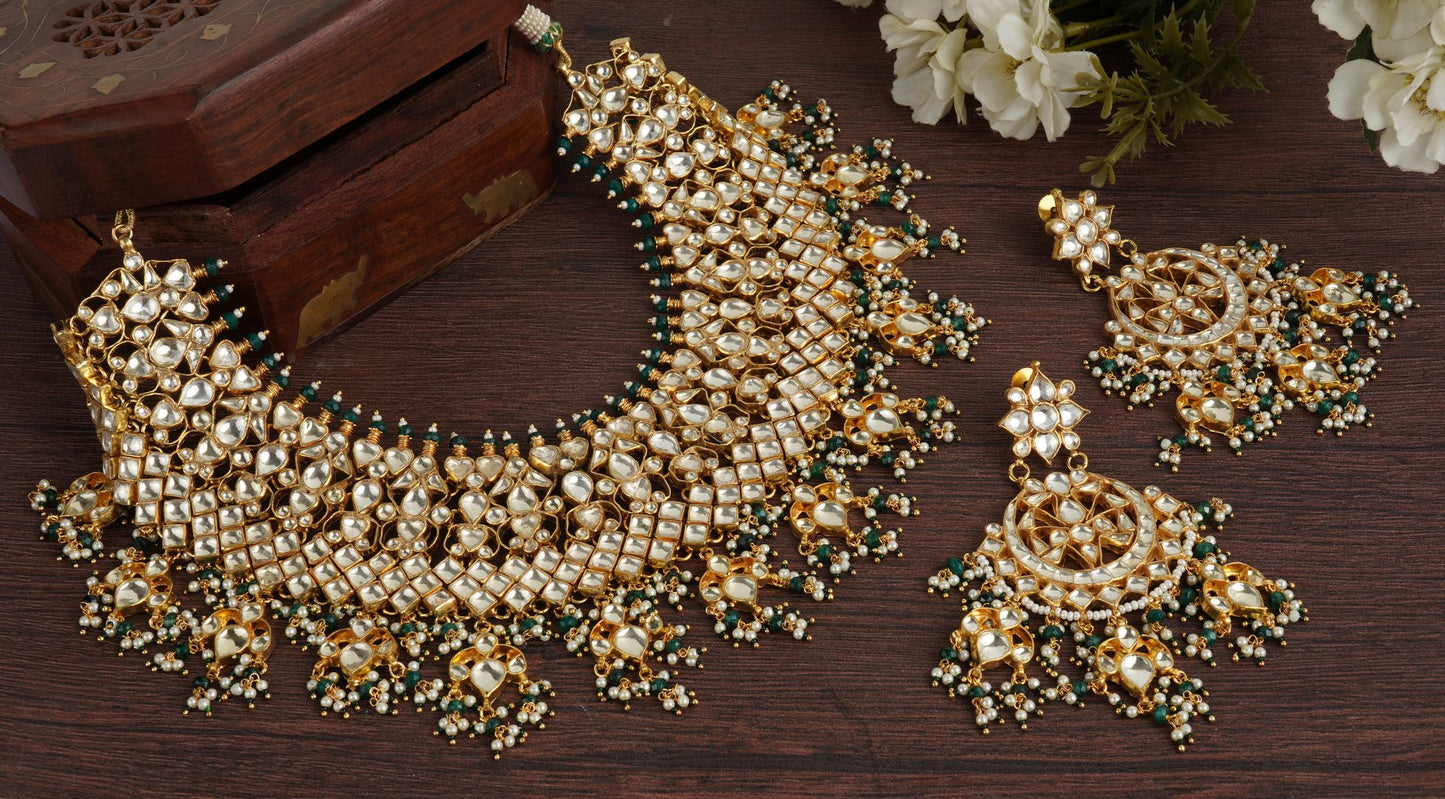 Kundan Necklace Set Plated in 22KT Gold with Pearl and Green Onyx Embellishments