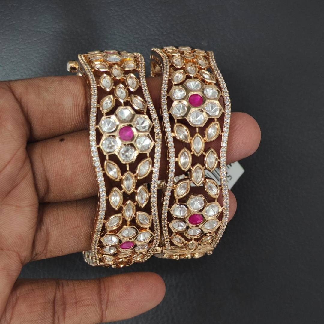 Gold-plated Kundan bangles with ruby pink stones and floral design for women