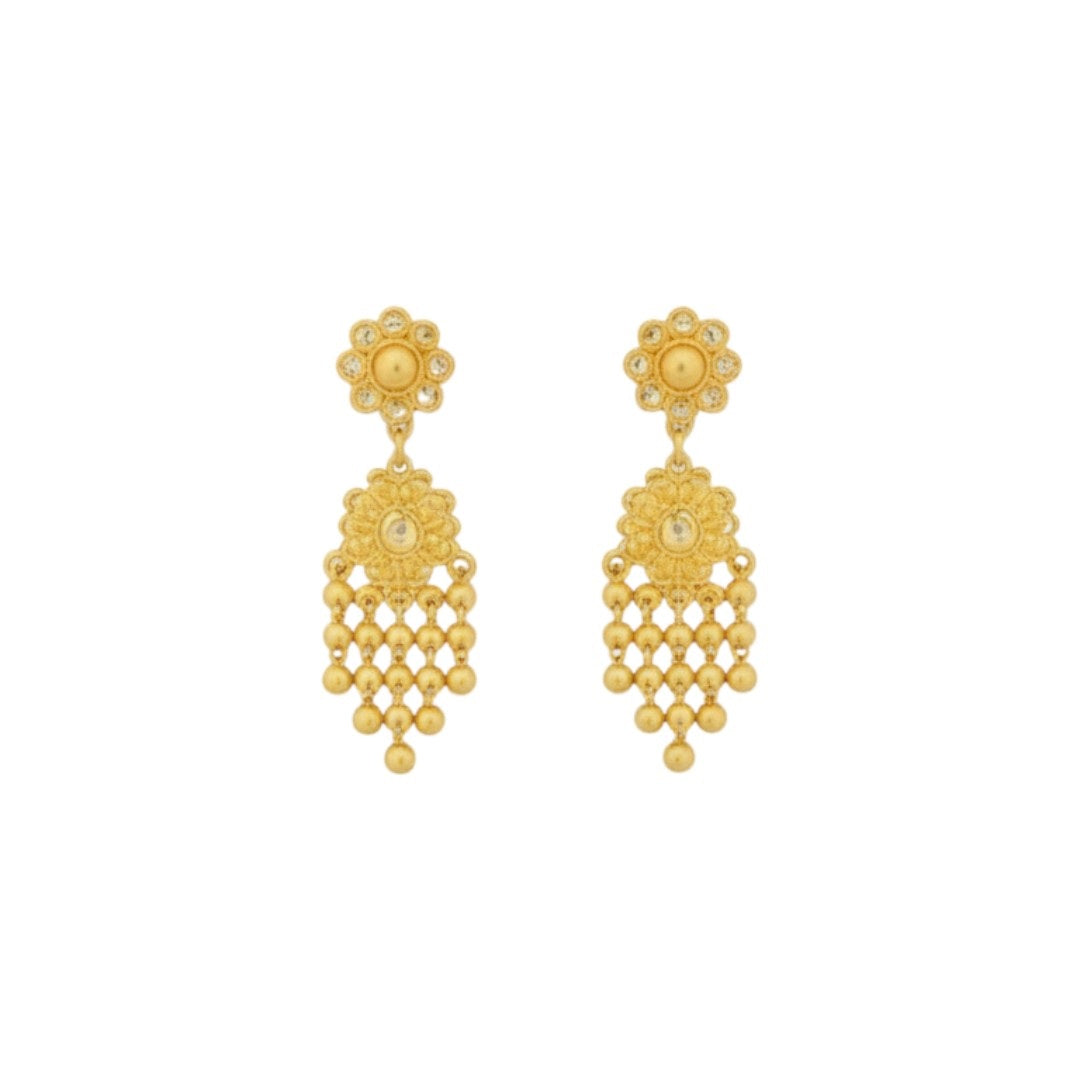 Elegant gold-plated necklace set with pearl-style bead design and matching earrings displayed on a red velvet stand.