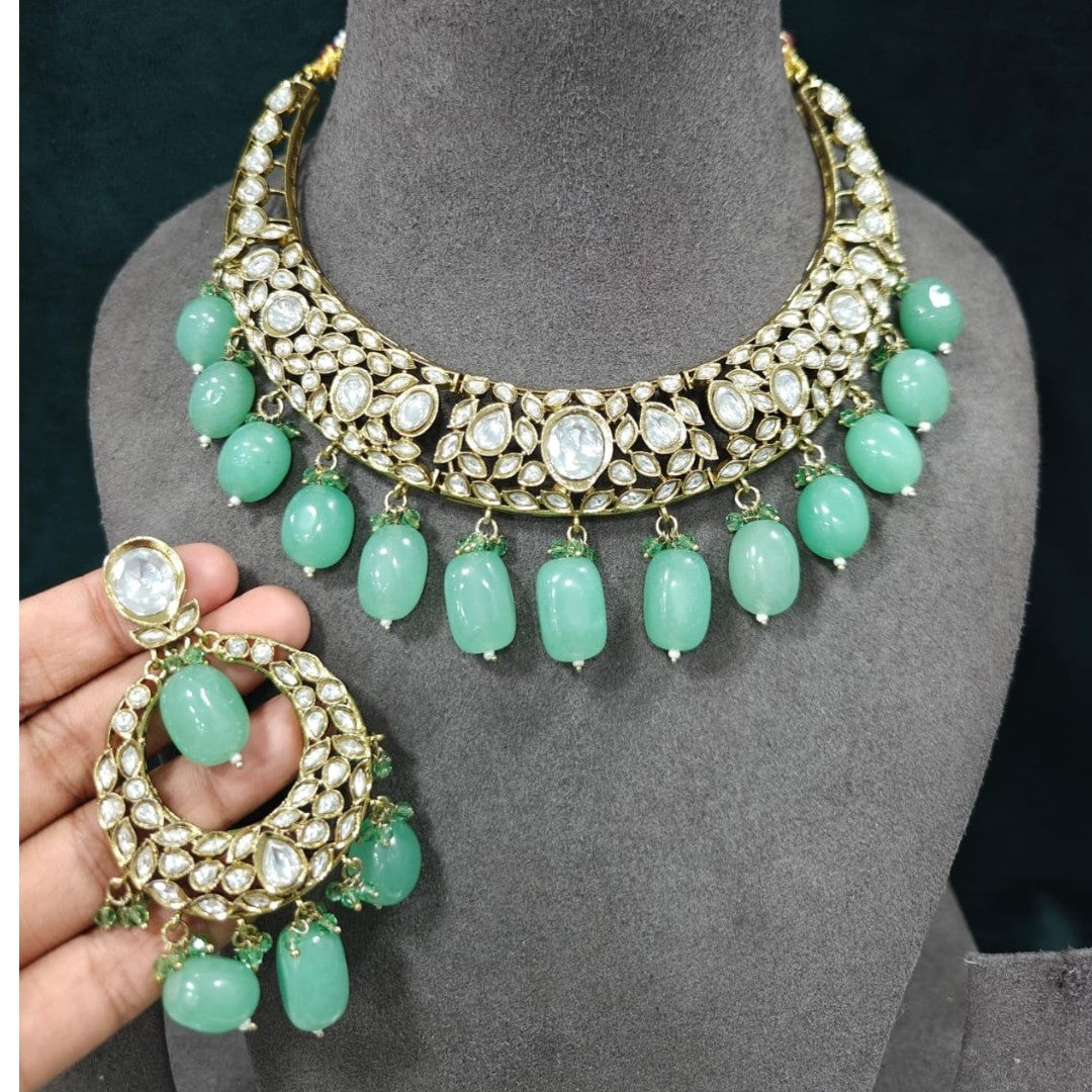 Green Kundan Polki choker necklace set with mint green bead drops and matching statement earrings for bridal, wedding, and traditional ethnic wear.