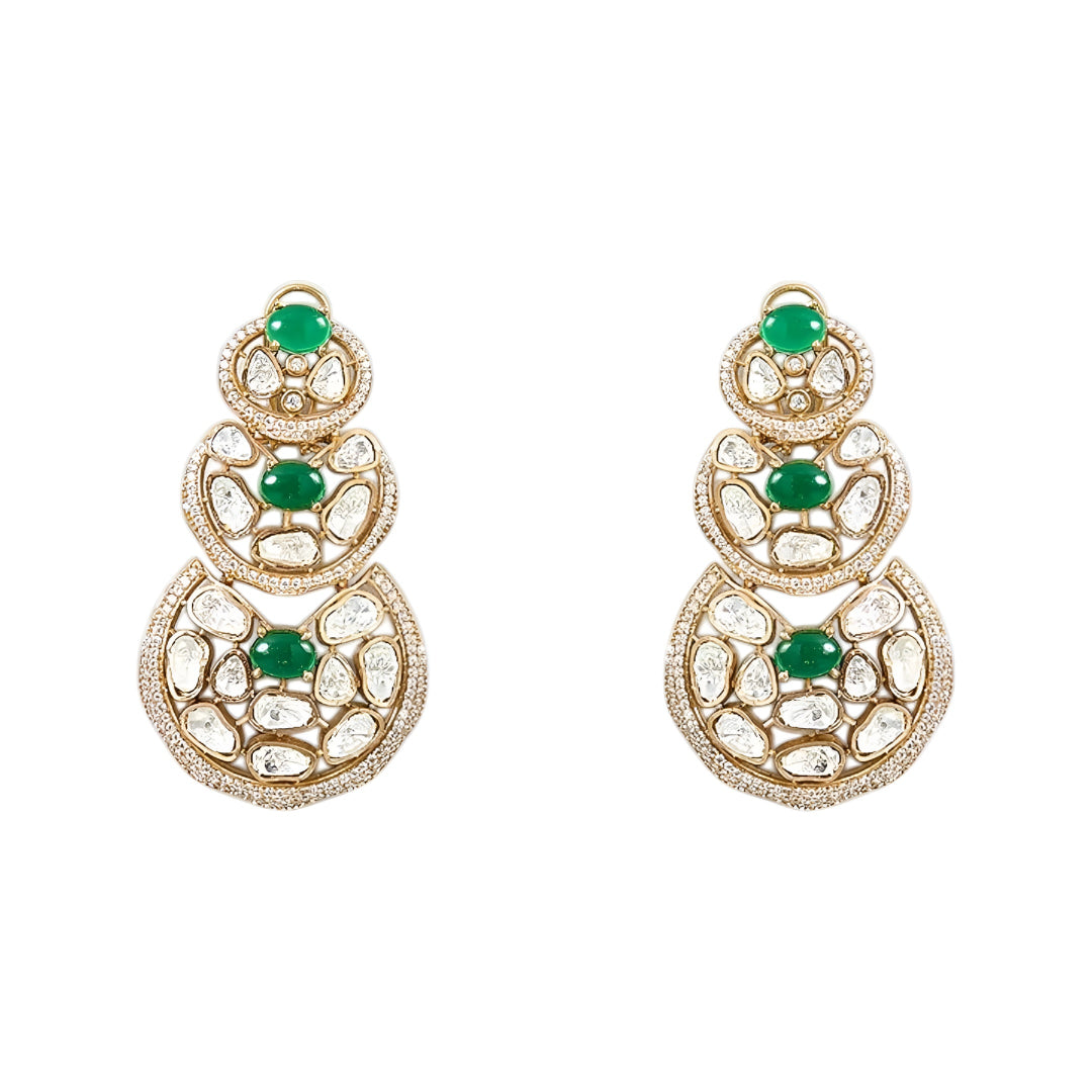 Luxury Kundan Polki necklace set with matching earrings featuring uncut Polki diamonds, green emerald accents, and traditional bridal jewelry craftsmanship in a gold finish.