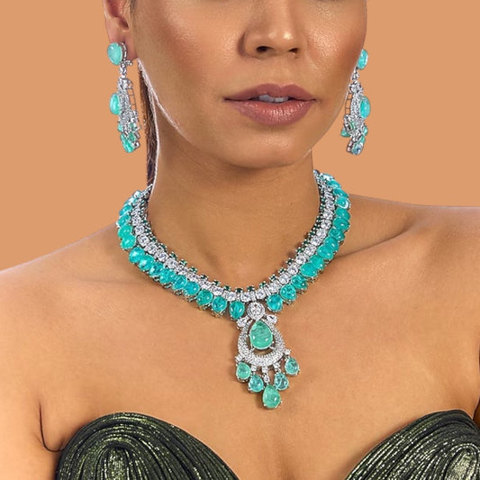 “Silver-toned green stone necklace set with matching earrings for women – elegant bridal and festive jewelry”