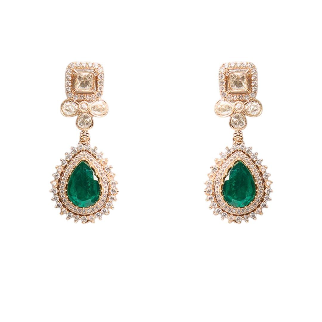 Beautiful Emerald Drop Kundan Earrings – Gold Plated Statement Jewelry - Auraa Trends - Earrings - - Auraa Trends - A pair of gold - finished Kundan earrings with emerald green teardrop stones and floral detailing, placed on a white background