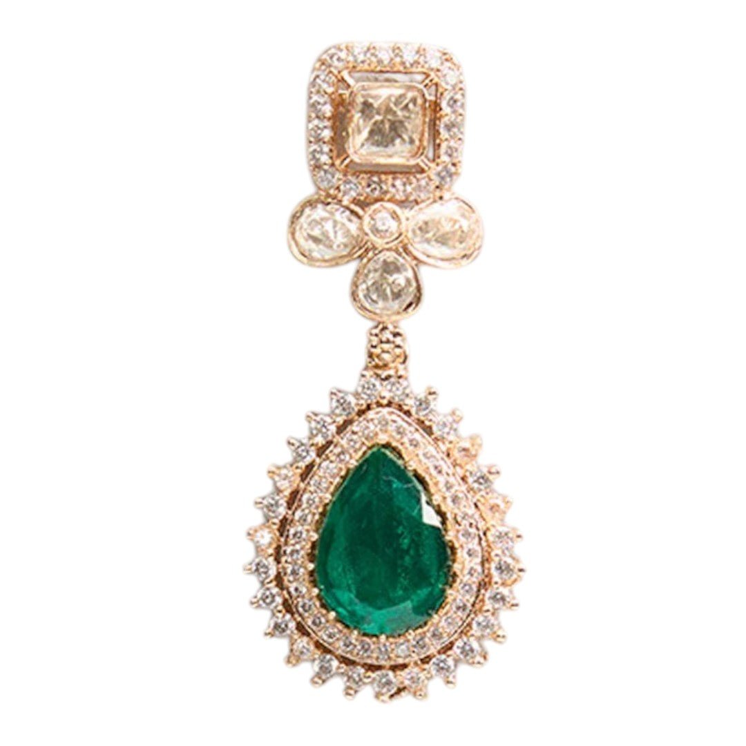 Beautiful Emerald Drop Kundan Earrings – Gold Plated Statement Jewelry - Auraa Trends - Earrings - - Auraa Trends - A pair of gold - finished Kundan earrings with emerald green teardrop stones and floral detailing, placed on a white background