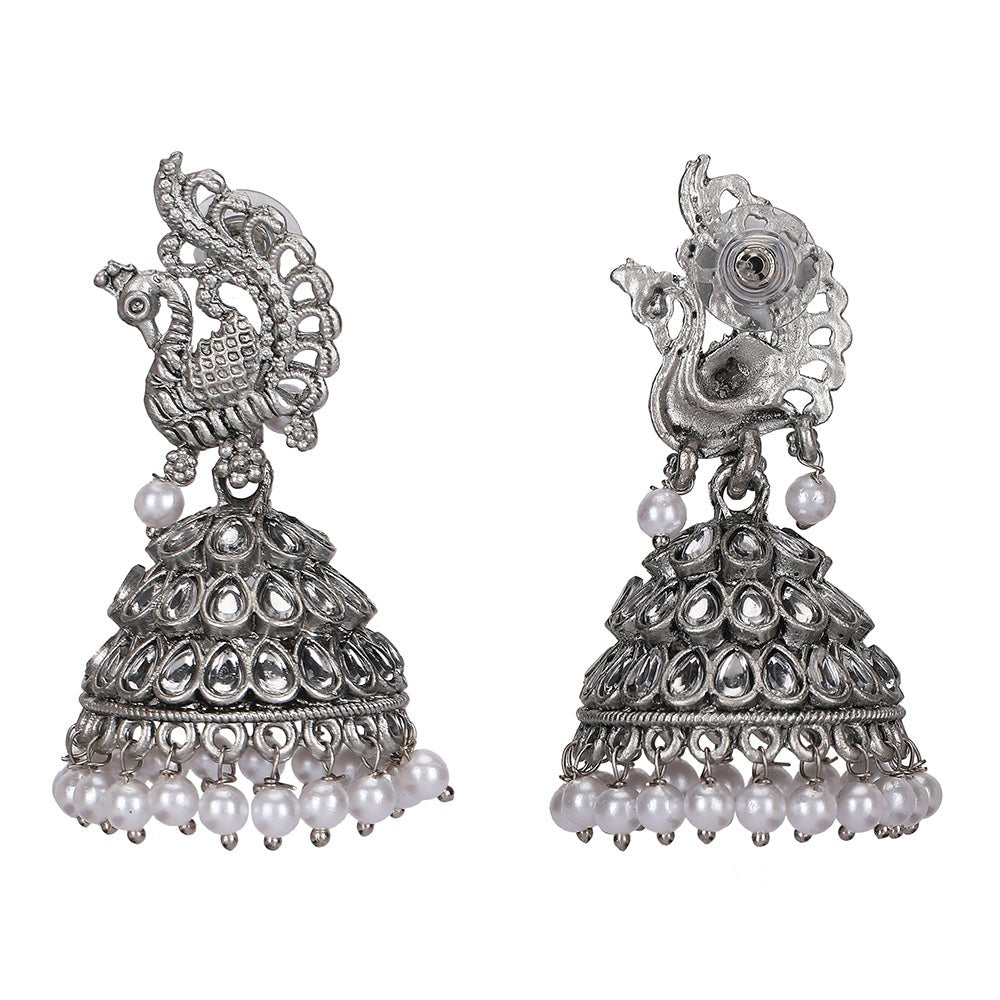 Buy Aviana Silver - Plated Crystal Studded Traditional Jhumka Earrings for Women - Auraa Trends - Jhumka - - Auraa Trends - Lady wearing silver - plated crystal peacock pattern jhumka earrings with pearl drops, Indian ethnic traditional jewellery