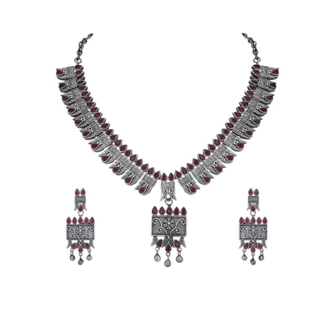 Buy Aviana Tribal Oxidized Silver-Plated Necklace Set Featuring Red Stone Embellishments and Dangling Drop Earrings - Auraa Trends