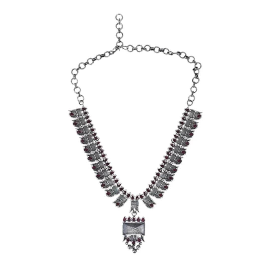 Buy Aviana Tribal Oxidized Silver-Plated Necklace Set Featuring Red Stone Embellishments and Dangling Drop Earrings - Auraa Trends