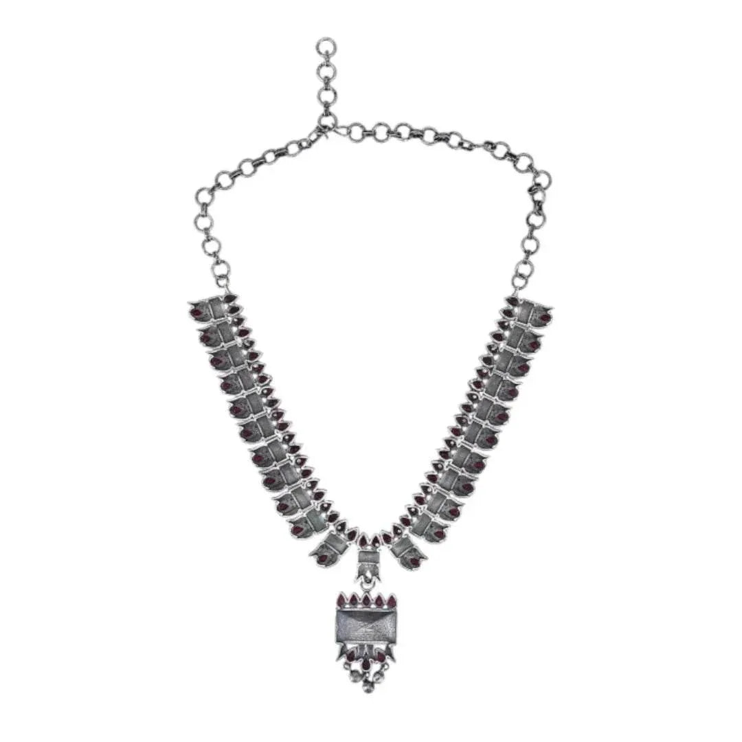 Buy Aviana Tribal Oxidized Silver-Plated Necklace Set Featuring Red Stone Embellishments and Dangling Drop Earrings - Auraa Trends