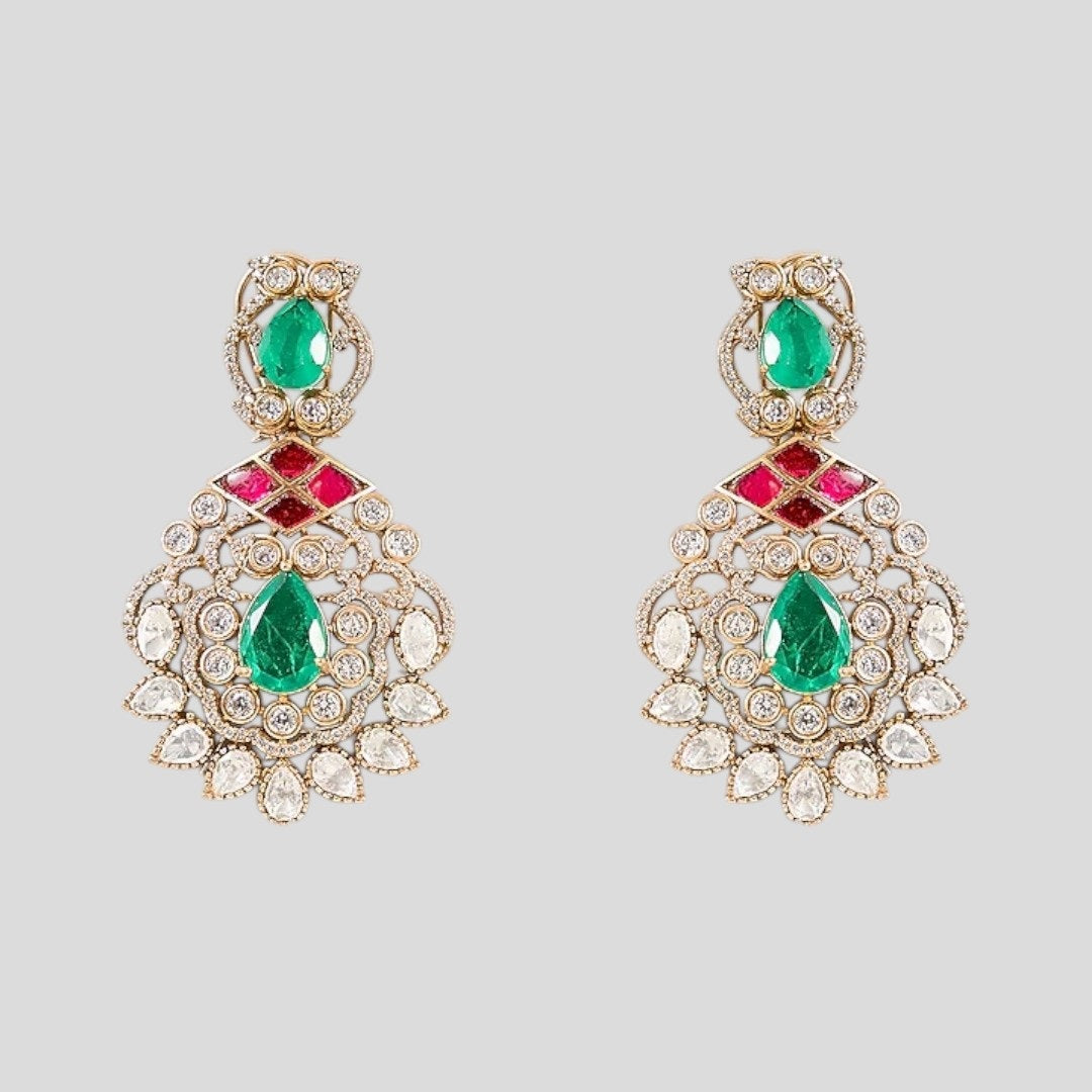 "Traditional Kundan bridal jewelry set with a gold-toned necklace featuring ruby and emerald stones, paired with matching earrings."