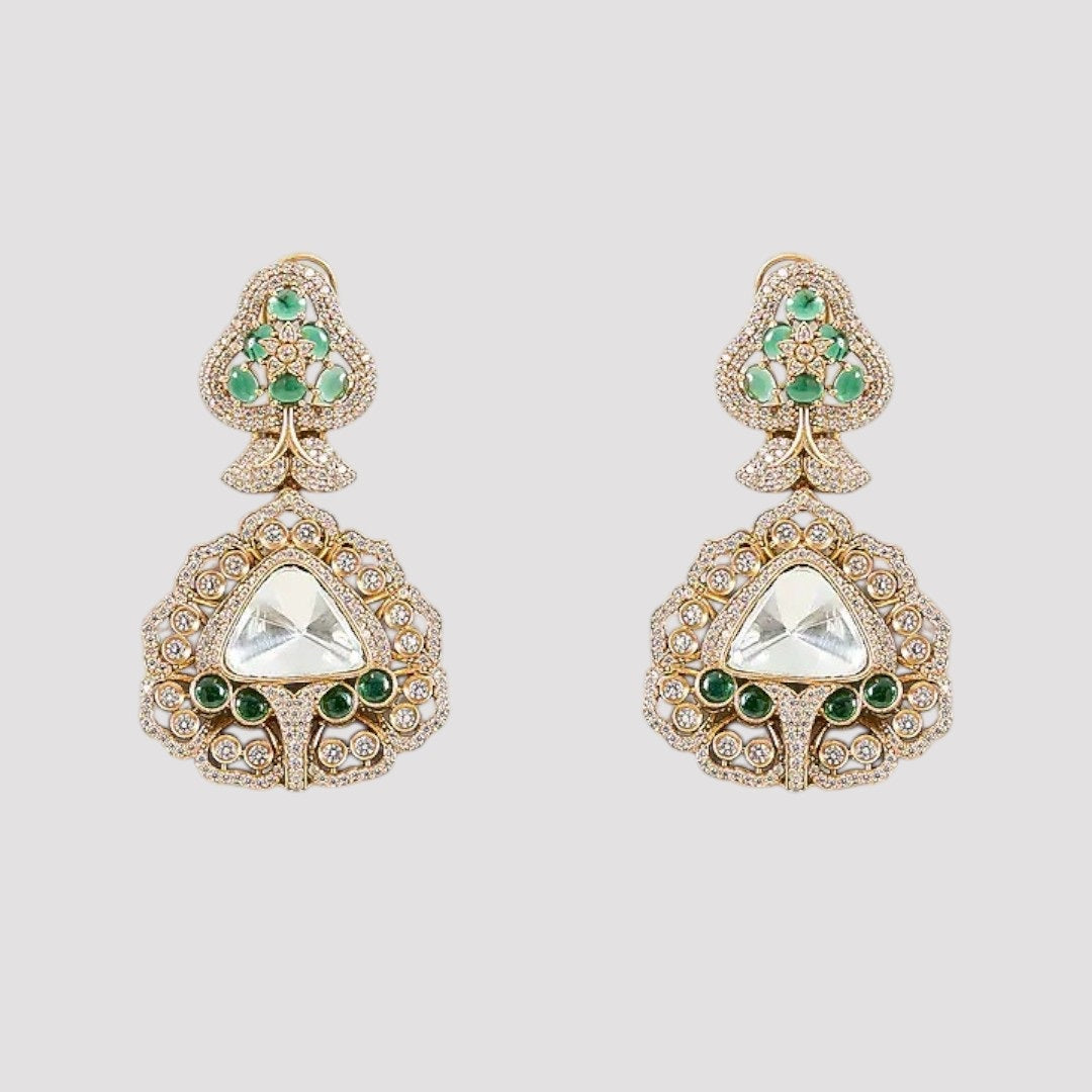 "Green Kundan and Polki bridal necklace set with matching earrings featuring gold-toned detailing and intricate craftsmanship."