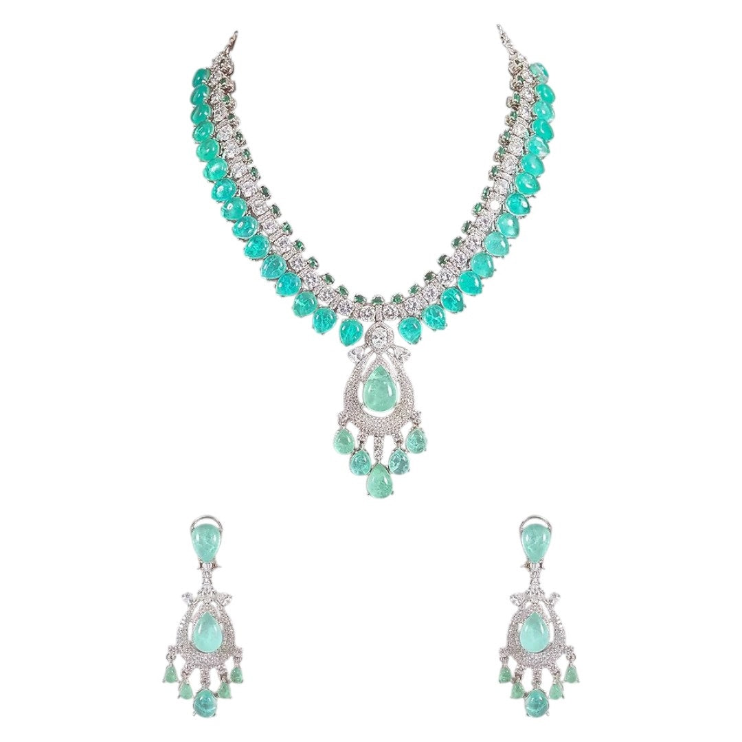 “Silver-toned green stone necklace set with matching earrings for women – elegant bridal and festive jewelry”