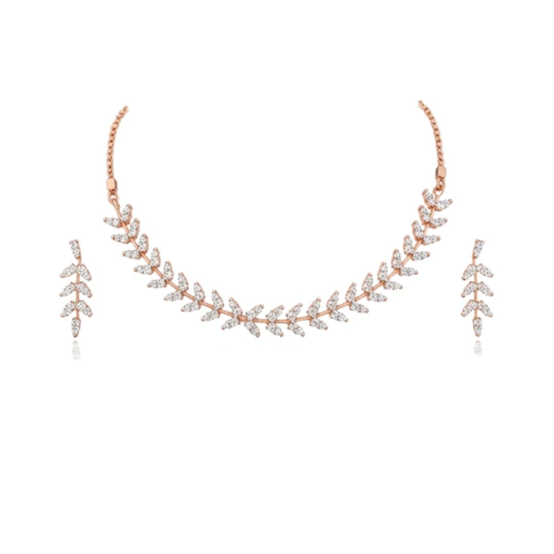 "Gold-plated leaf design choker necklace set with matching earrings displayed on black stand"