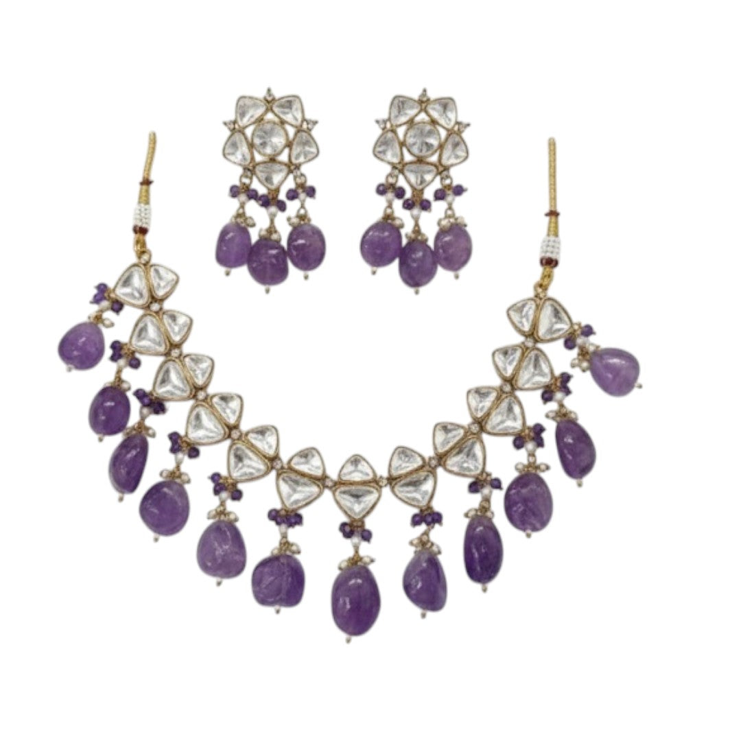 Elegant kundan choker necklace set with amethyst stones and pearl detailing, perfect for weddings and festive occasions.