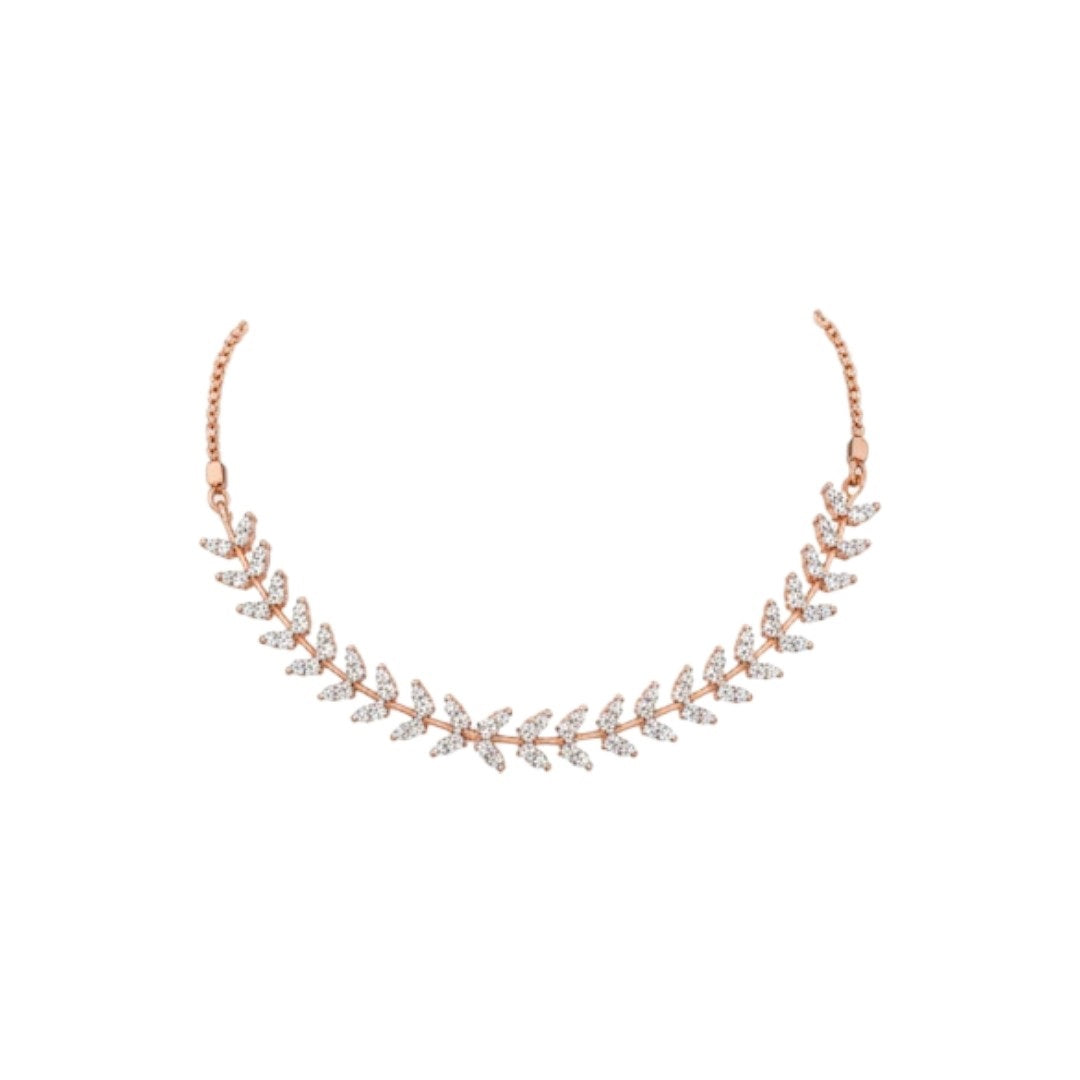 "Gold-plated leaf design choker necklace set with matching earrings displayed on black stand"