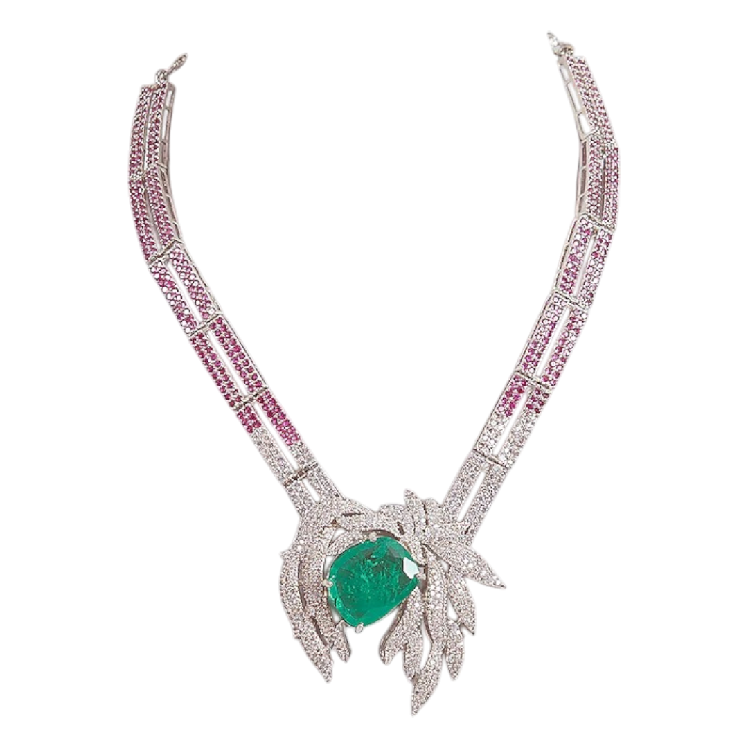 Emerald and diamond leaf design necklace and earrings set with ruby-pink accents on silver base – luxury women’s jewelry set