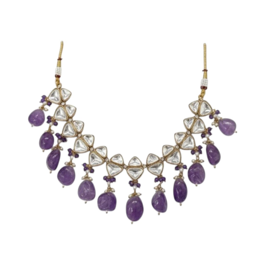 Elegant kundan choker necklace set with amethyst stones and pearl detailing, perfect for weddings and festive occasions.