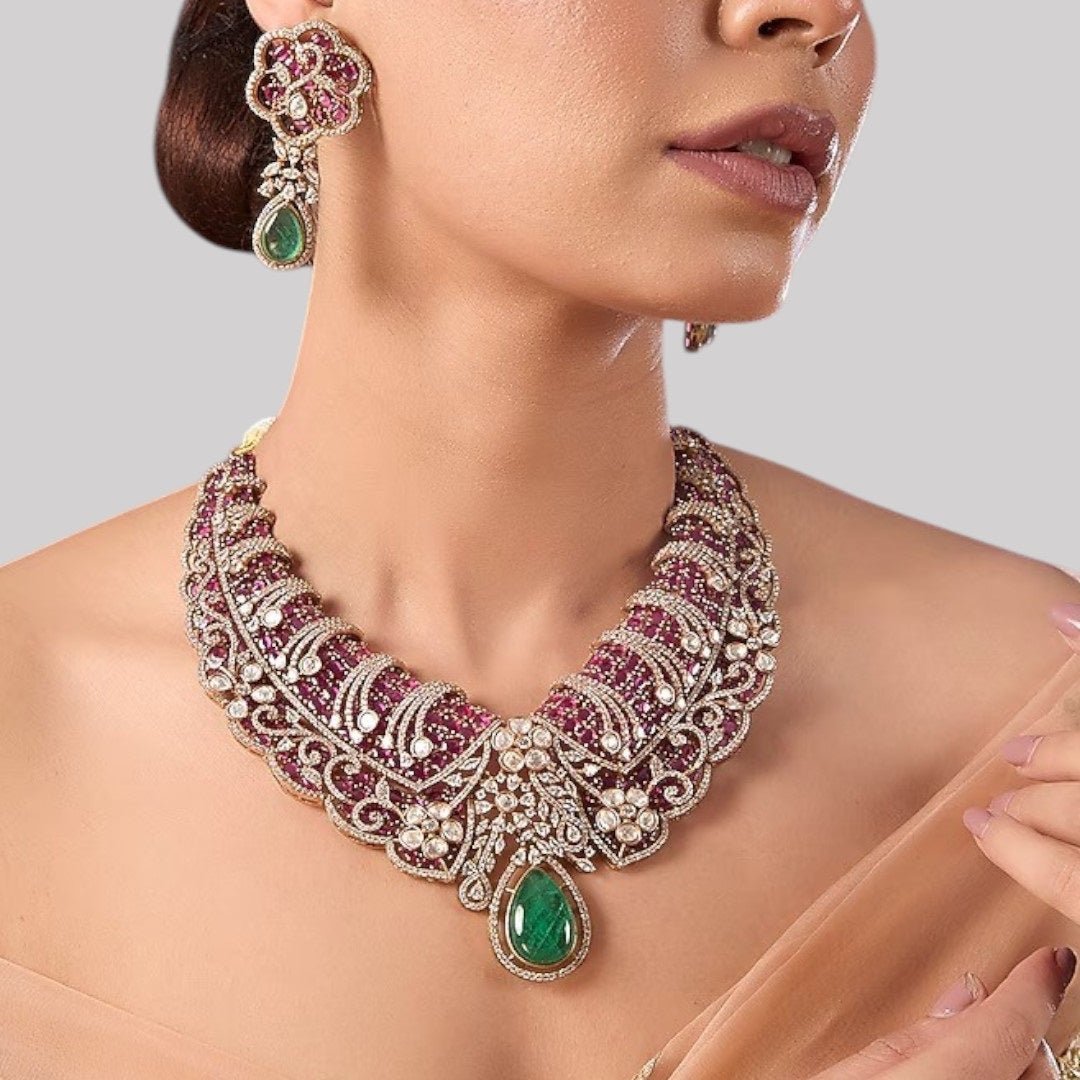 Designer Ruby & Green Stone Kundan Statement Necklace Set with Drop Earrings for Women - Auraa Trends - Necklace Set - - Auraa Trends - Woman wearing ruby and green stone Kundan statement necklace with earrings