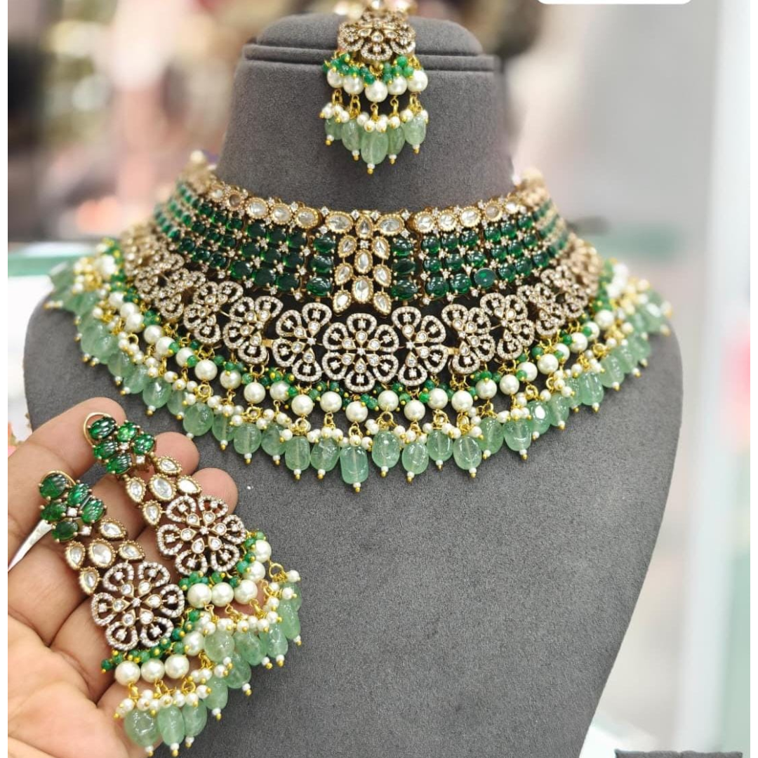 "Bridal Kundan choker necklace set with green beads, pearls, and matching earrings and maang tikka – traditional Indian jewelry for women"