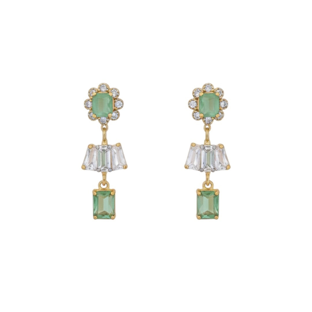 Gold-plated green and white American diamond necklace set with matching earrings on red display stand"