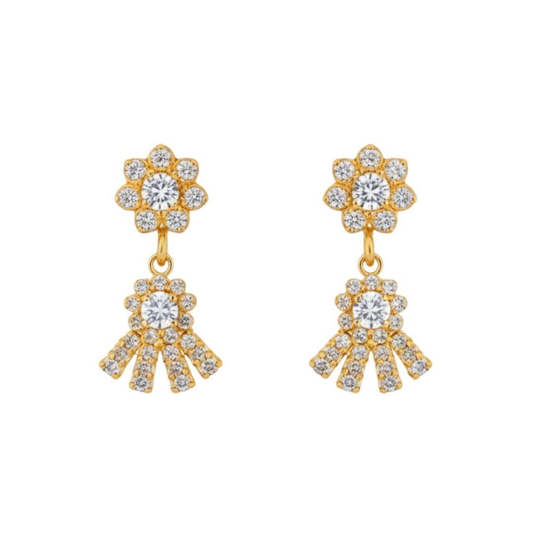 "Gold-plated floral necklace set with stone-studded motifs and matching earrings displayed on black stand – ideal for weddings and festive wear."