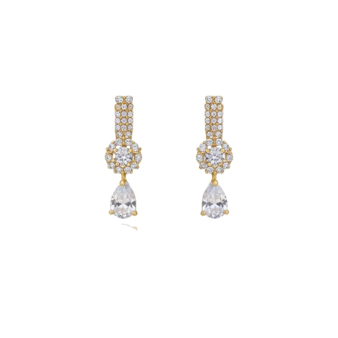 "Gold-plated floral diamond necklace set with matching earrings displayed on red velvet stand – ideal for weddings and festive occasions."
