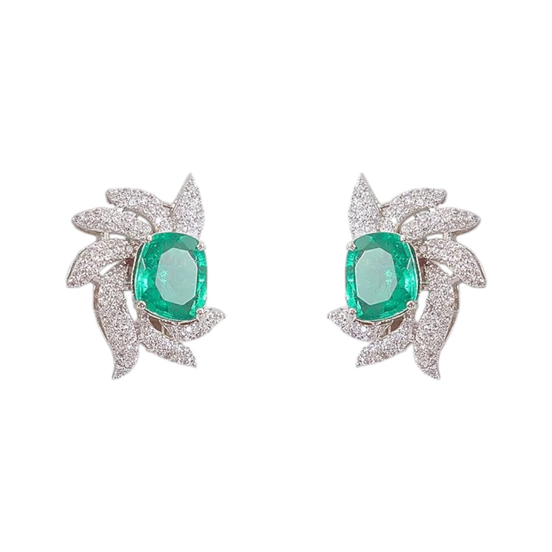 Emerald and diamond leaf design necklace and earrings set with ruby-pink accents on silver base – luxury women’s jewelry set