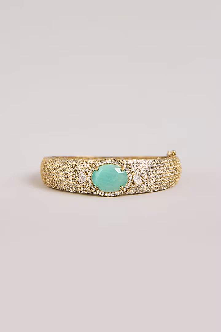 Mint green stone AD studded gold tone designer kada with sparkling white stones