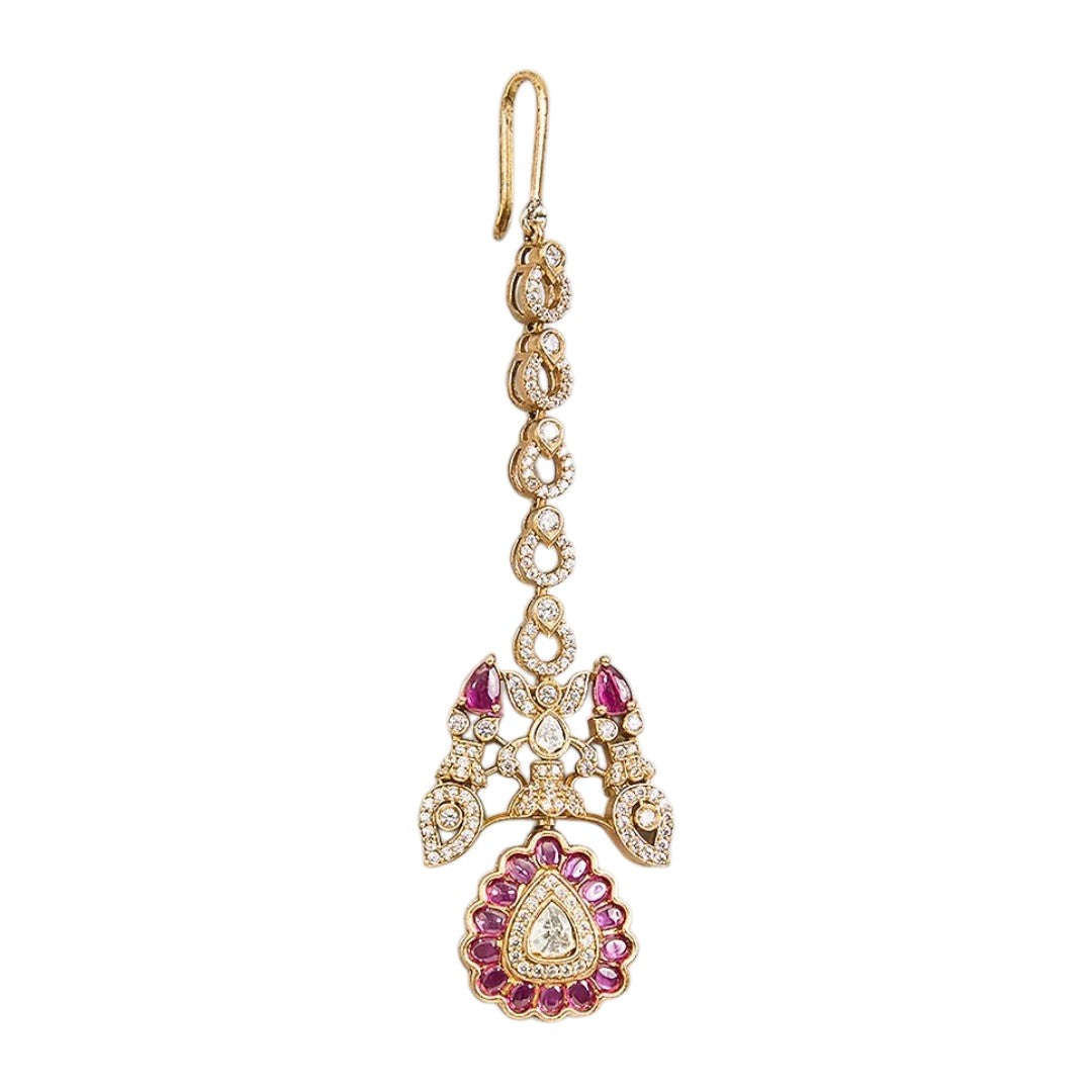 Gold finish American diamond maang tikka with ruby pink oval stone medallion, clear pear centre stone, zircon teardrop chain and ruby pink pear accents – Auraa Trends