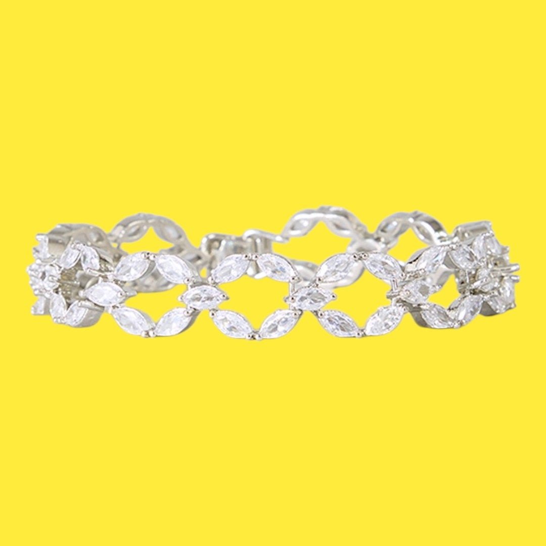 Elegant Silver - Toned Cubic Zirconia Leaf Design Bracelet for Women - Auraa Trends - Bracelet - - Auraa Trends - Silver bracelet with cubic zirconia in leaf pattern design