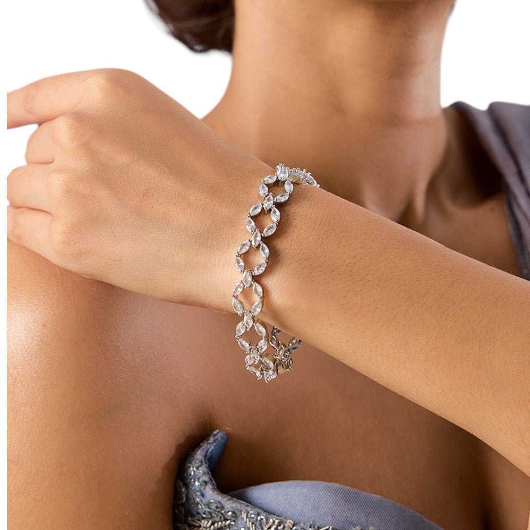 Elegant Silver - Toned Cubic Zirconia Leaf Design Bracelet for Women - Auraa Trends - Bracelet - - Auraa Trends - Silver bracelet with cubic zirconia in leaf pattern design