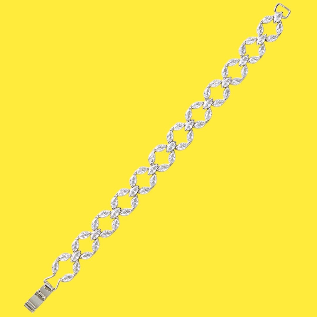 Elegant Silver - Toned Cubic Zirconia Leaf Design Bracelet for Women - Auraa Trends - Bracelet - - Auraa Trends - Silver bracelet with cubic zirconia in leaf pattern design