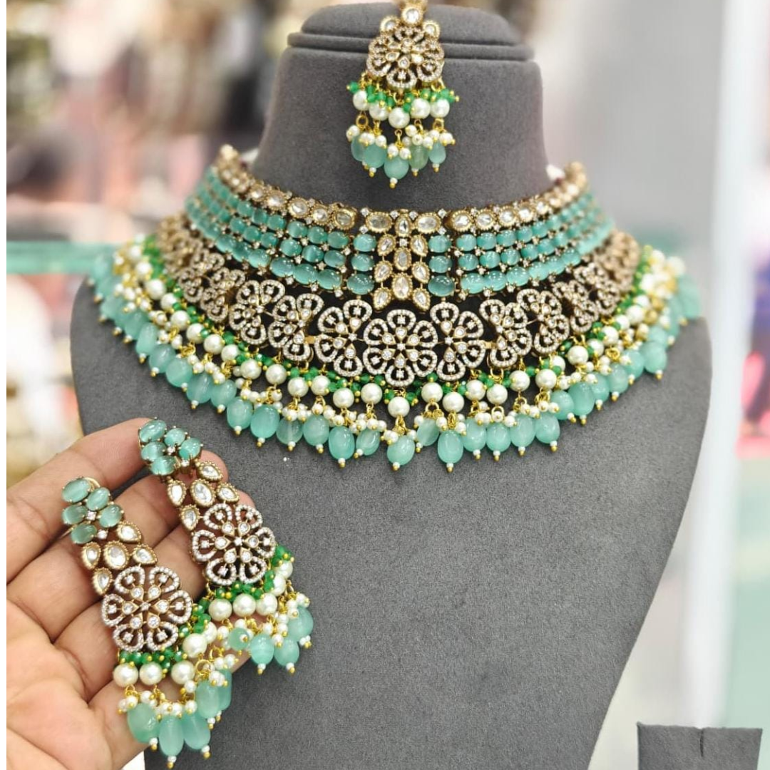 "Bridal Kundan choker necklace set with green beads, pearls, and matching earrings and maang tikka – traditional Indian jewelry for women"