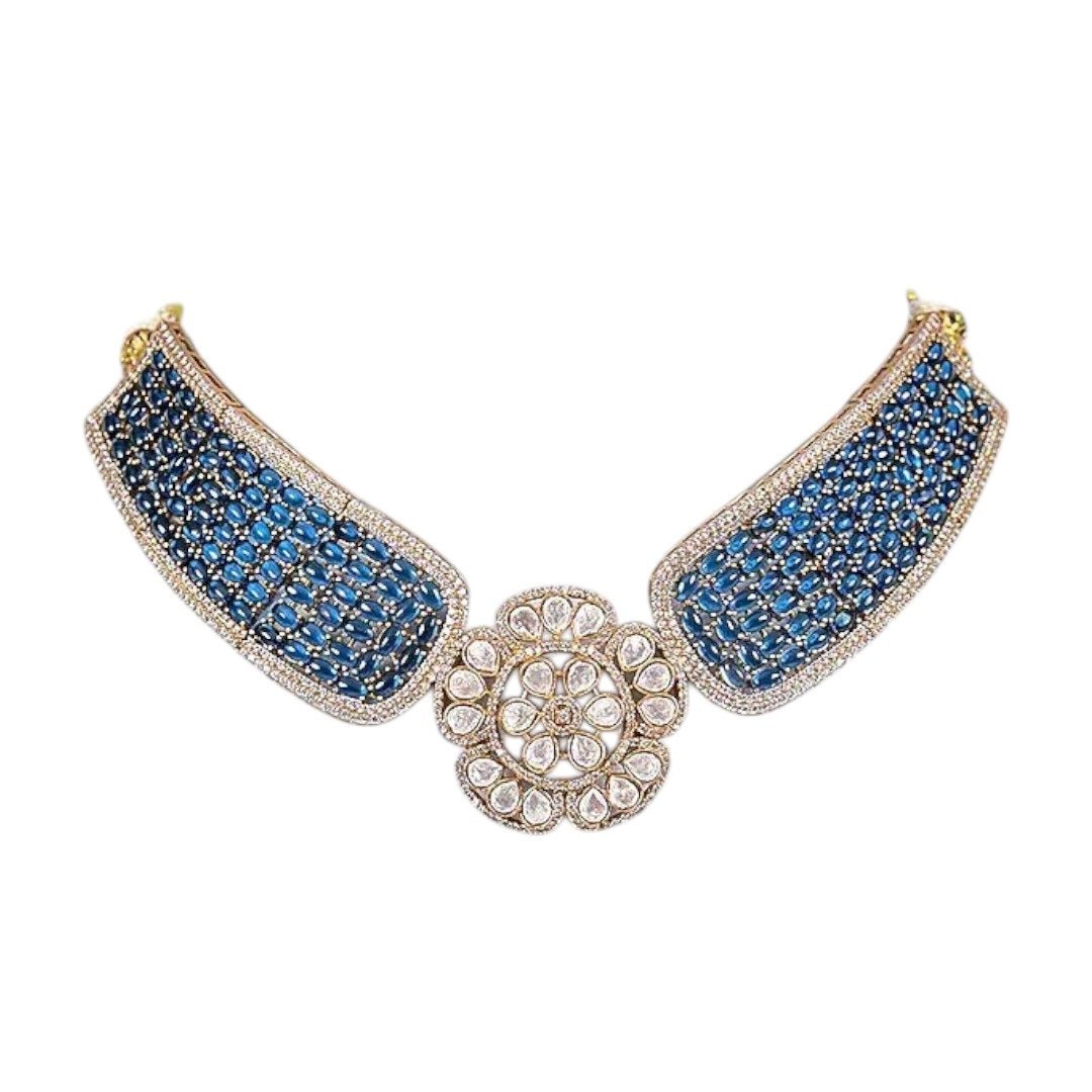Gold - Plated Blue Stone Encrusted Choker Necklace Set with Floral Earrings - Auraa Trends - Necklace Set - - Auraa Trends - Model wearing a gold - plated blue stone choker necklace set with kundan - style floral centerpiece and matching floral earrings, perfect for modern ethnic looks.