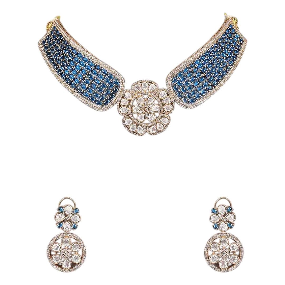 Gold - Plated Blue Stone Encrusted Choker Necklace Set with Floral Earrings - Auraa Trends - Necklace Set - - Auraa Trends - Model wearing a gold - plated blue stone choker necklace set with kundan - style floral centerpiece and matching floral earrings, perfect for modern ethnic looks.