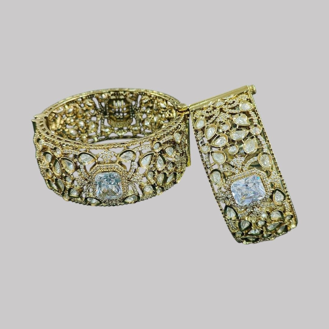 Gold - Plated Kundan Bridal Bangles with Sparkling Clear Center Stone - Auraa Trends - Bangles - - Auraa Trends - “Heavy gold - plated bridal kundan bangles with clear square - cut center stone, traditional Indian wedding jewelry on dark green velvet background.”
