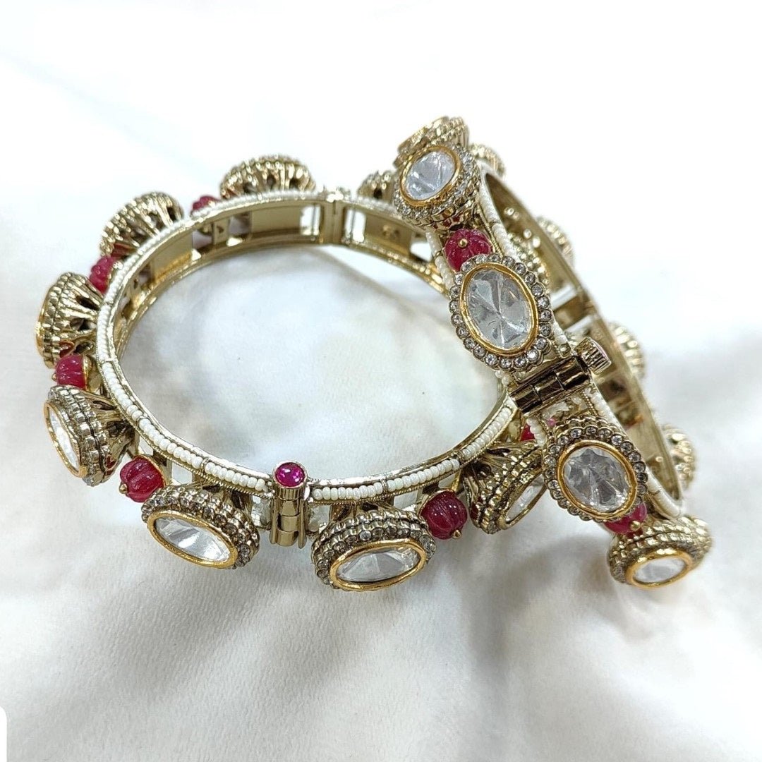 Gold Plated Pink Bead Kundan Studded Traditional Bangles for Women - Auraa Trends - Bangles - - Auraa Trends - Traditional gold plated bangles with white kundan stones and pink beads – festive Indian bridal jewelry for women.