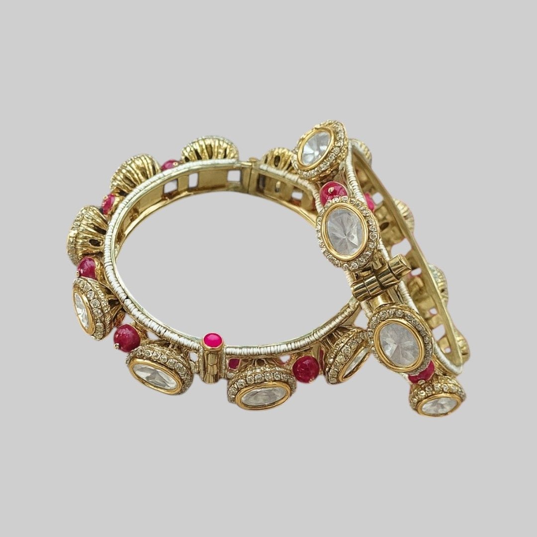 Gold Plated Pink Bead Kundan Studded Traditional Bangles for Women - Auraa Trends - Bangles - - Auraa Trends - Traditional gold plated bangles with white kundan stones and pink beads – festive Indian bridal jewelry for women.