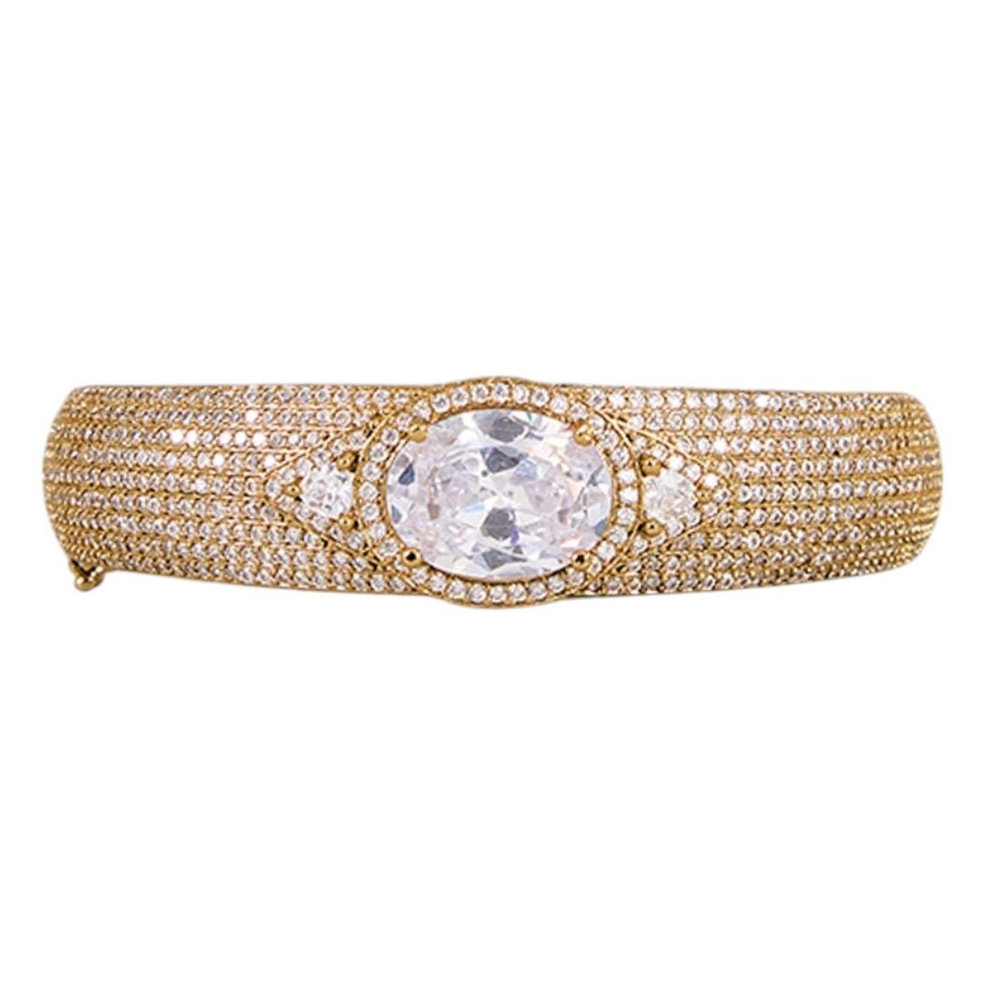 Gold - Plated Statement Bangle with Oval CZ Stone and Pave Crystal Detailing - Auraa Trends - Bangles - - Auraa Trends - Gold plated statement bangle with oval cubic zirconia and micro pave setting for party and bridal wear
