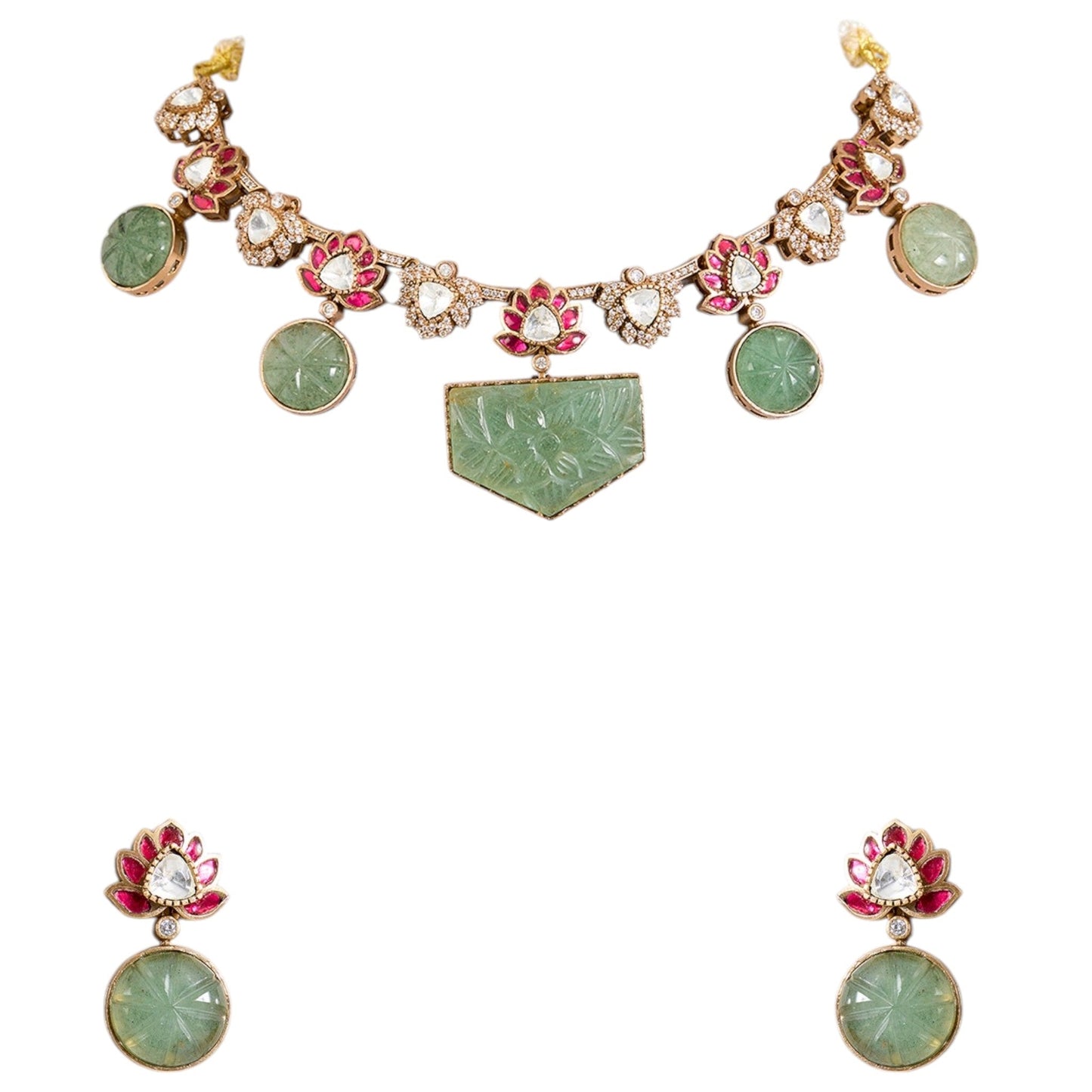 Lotus Motif Carved Green Stone Necklace Set with Earrings | Ethnic & Festive Jewelry - Auraa Trends - Necklace - - Auraa Trends - “Necklace set with lotus motif and carved green stones with earrings” “Traditional gold - tone necklace with pink lotus and kundan stones” “Ethnic lotus design choker set with matching earrings”
