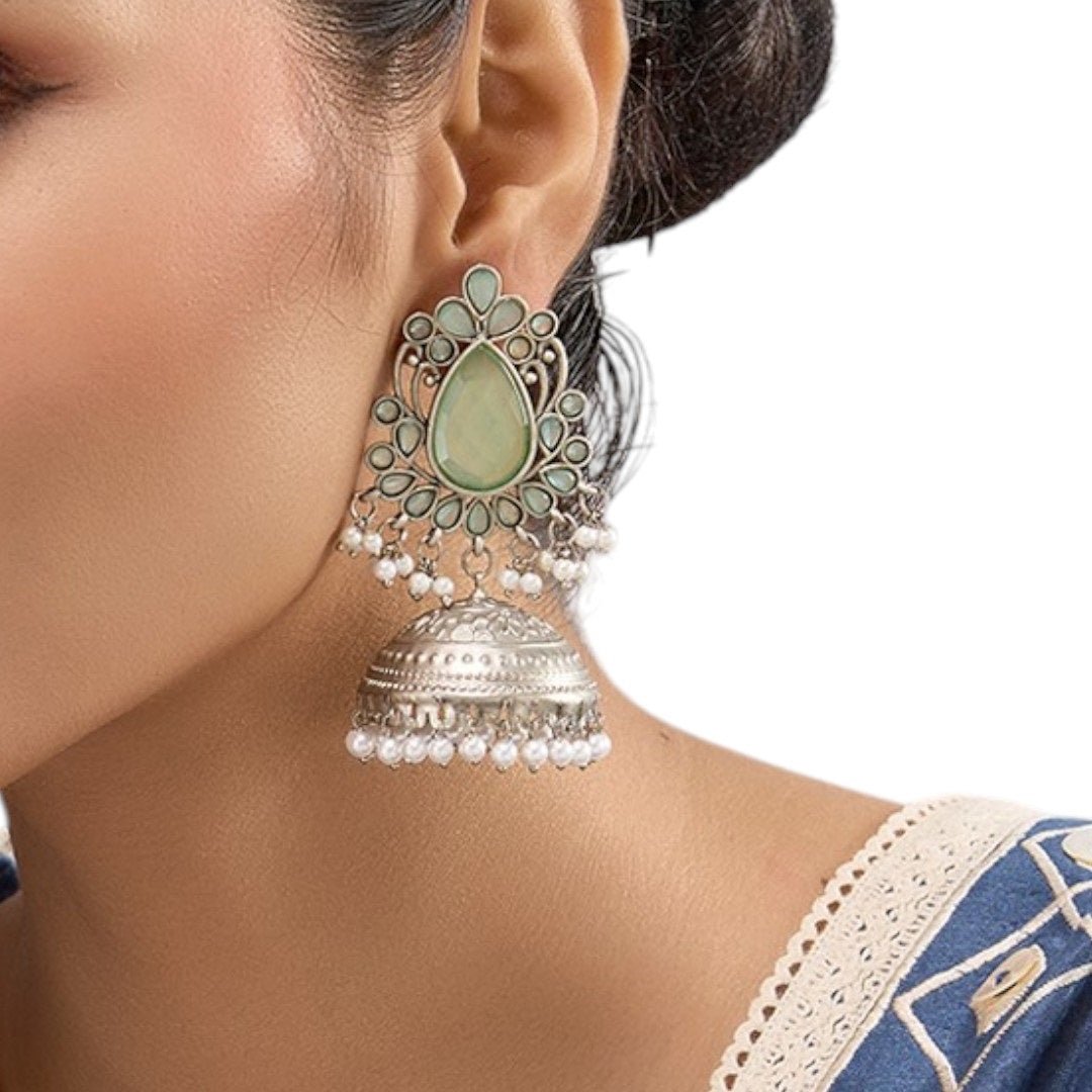 Oxidized Silver Jhumka Earrings with Mint Green Stones & Pearl Drops - Auraa Trends - Earrings - - Auraa Trends - "Oxidized silver jhumka earrings with mint green teardrop stones, floral top design and white pearl bead danglers – traditional ethnic jewelry for women."
