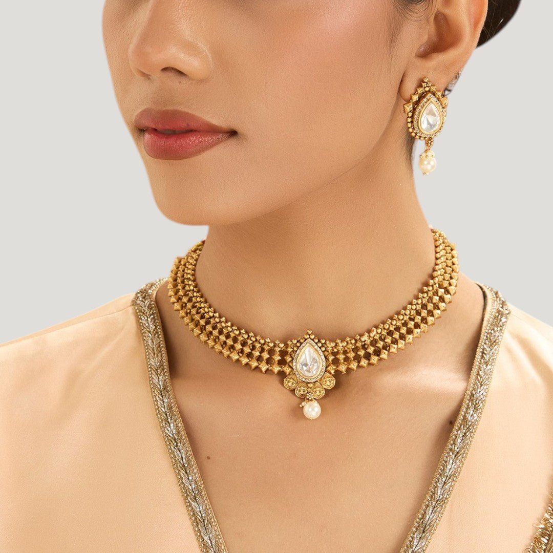 Vintage Gold Choker Necklace Collection Featuring Pearl Drop Accents - Auraa Trends - Choker - - Auraa Trends - Antique gold choker necklace set with matching teardrop earrings, pearlesque drop accents and pyramid design motifs on a light grey background