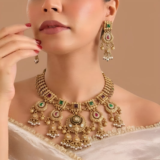 Antique gold Heritage necklace set with ruby-pink and emerald-green chandbali medallions and pearl drops