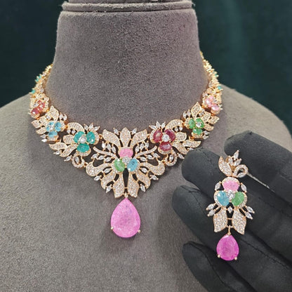 Rose gold plated American diamond necklace set with multicolour pastel flower stones, pink teardrop pendant and matching earrings