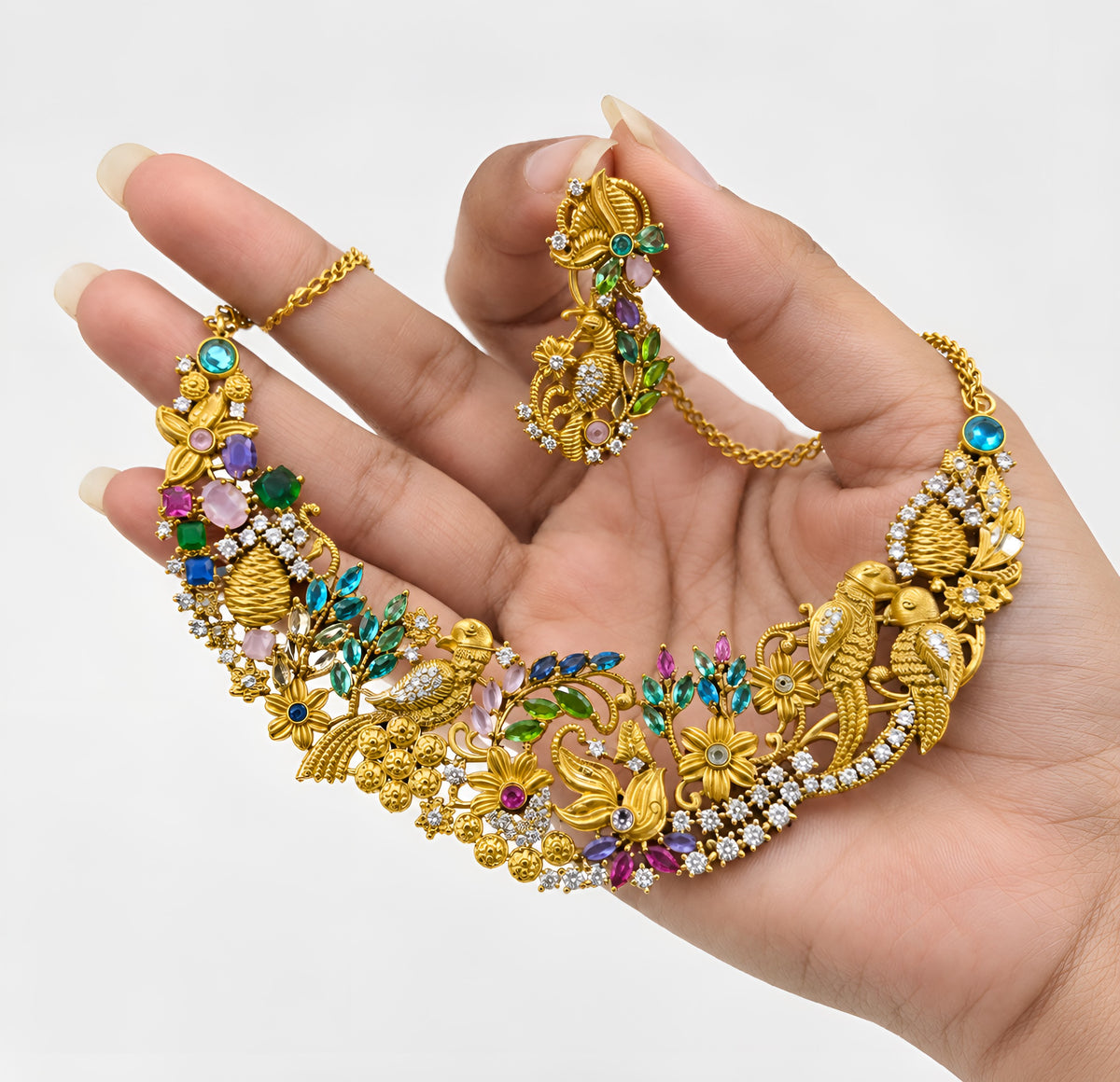 Matching gold bird motif earring with multicolour stones and chain